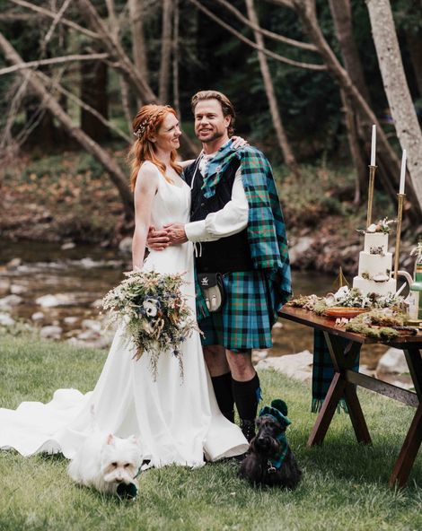 Scottish blue and green wedding inspiration with tartan kilts, a bagpiper, whiskey station and Scotty dogs.