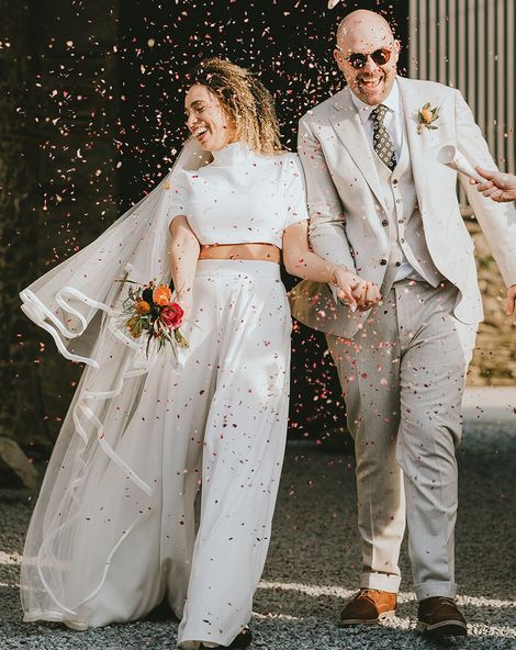 confetti moment for bride and groom