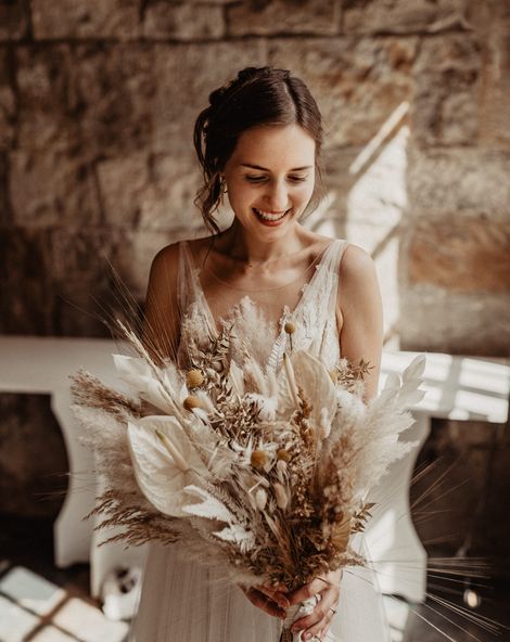 Bride with Dried Flower Wedding Bouquet