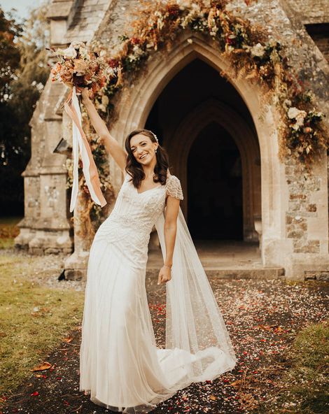 Bride in autumn wedding dress with beaded embellished decor