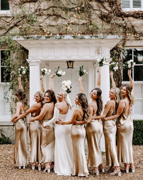 Black tie wedding at Northbrook Park with champagne gold bridesmaid dresses 