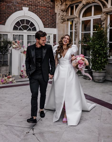 Stylish Mayfair wedding inspiration with Love In Lace Bridal gown with pockets and peeled back blush roses
