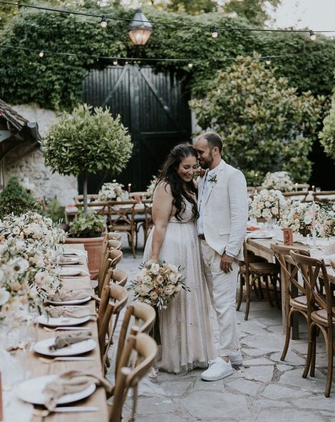 outdoor boho wedding ceremony and reception at La dime de giverny with Catherine Deane wedding dress