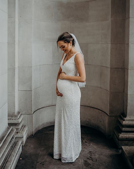 bride in sparkly sequin maternity wedding dress