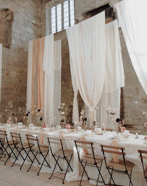 Blackfriars Priory gothic wedding inspiration with drapes, dried flowers and a concrete wedding cake.