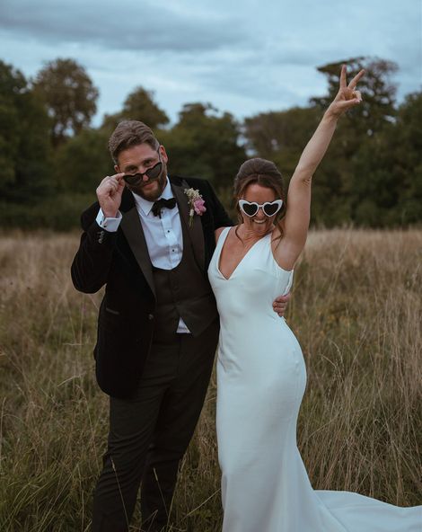 The Pear Tree Purton wedding with bride and groom wearing fun sunglasses.