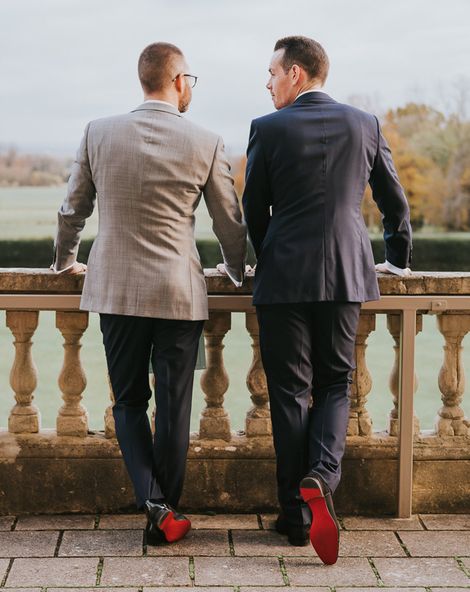 Louboutin groom shoes worn by two grooms for their country house gay wedding.
