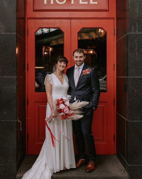 The Bedford in London wedding with bride in a sparkly wedding dress and groom in navy suit.