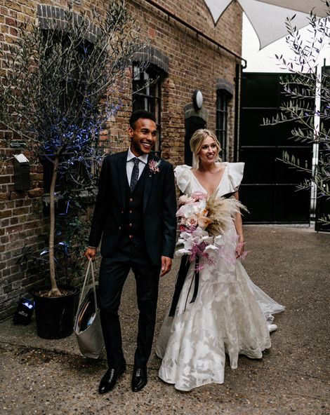 Contemporary London Wedding at The Loft Studios with Ruffle Wedding Dress by Epic Love Story 