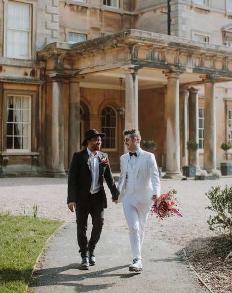 red, pink, black and white groom suit ideas for LGBTQI+ inspiration at Prestwold Hall Barns