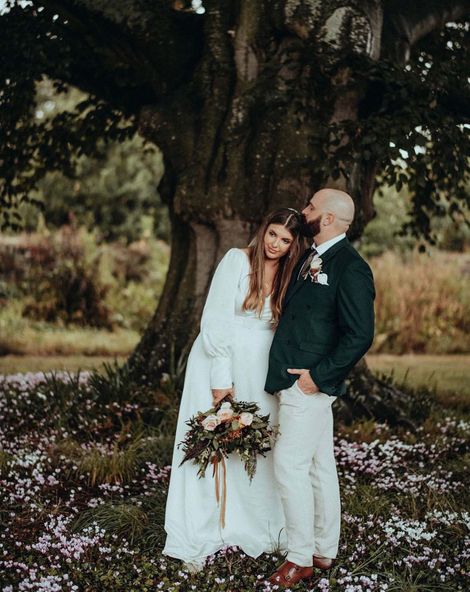 Luna Bea Bridal gown for an autumnal wedding at Elmore Court with dried flowers and rust tones 