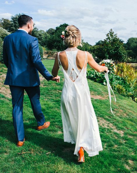 colourful pennard house wedding with bride wearing racerback dress