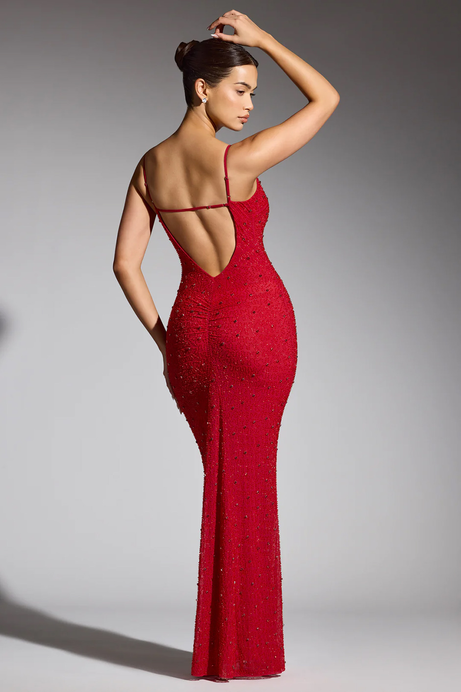 Red wedding guest dress from Oh Polly with embellished design, plunge neckline and low back