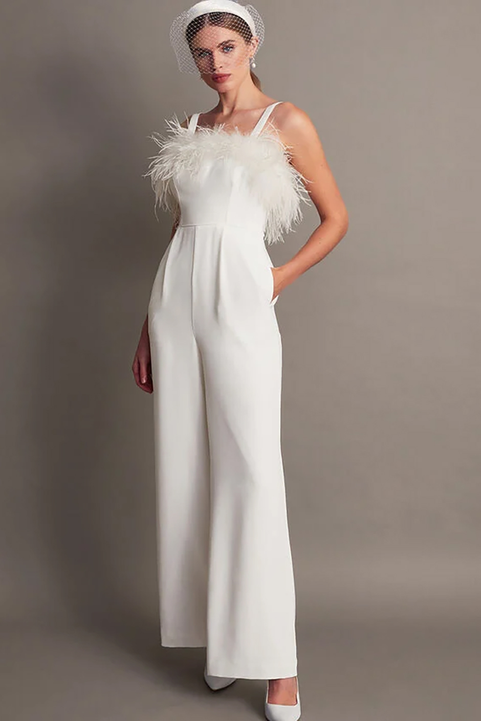 Wide leg bridal jumpsuit with pockets and feather trimmed neckline from Monsoon
