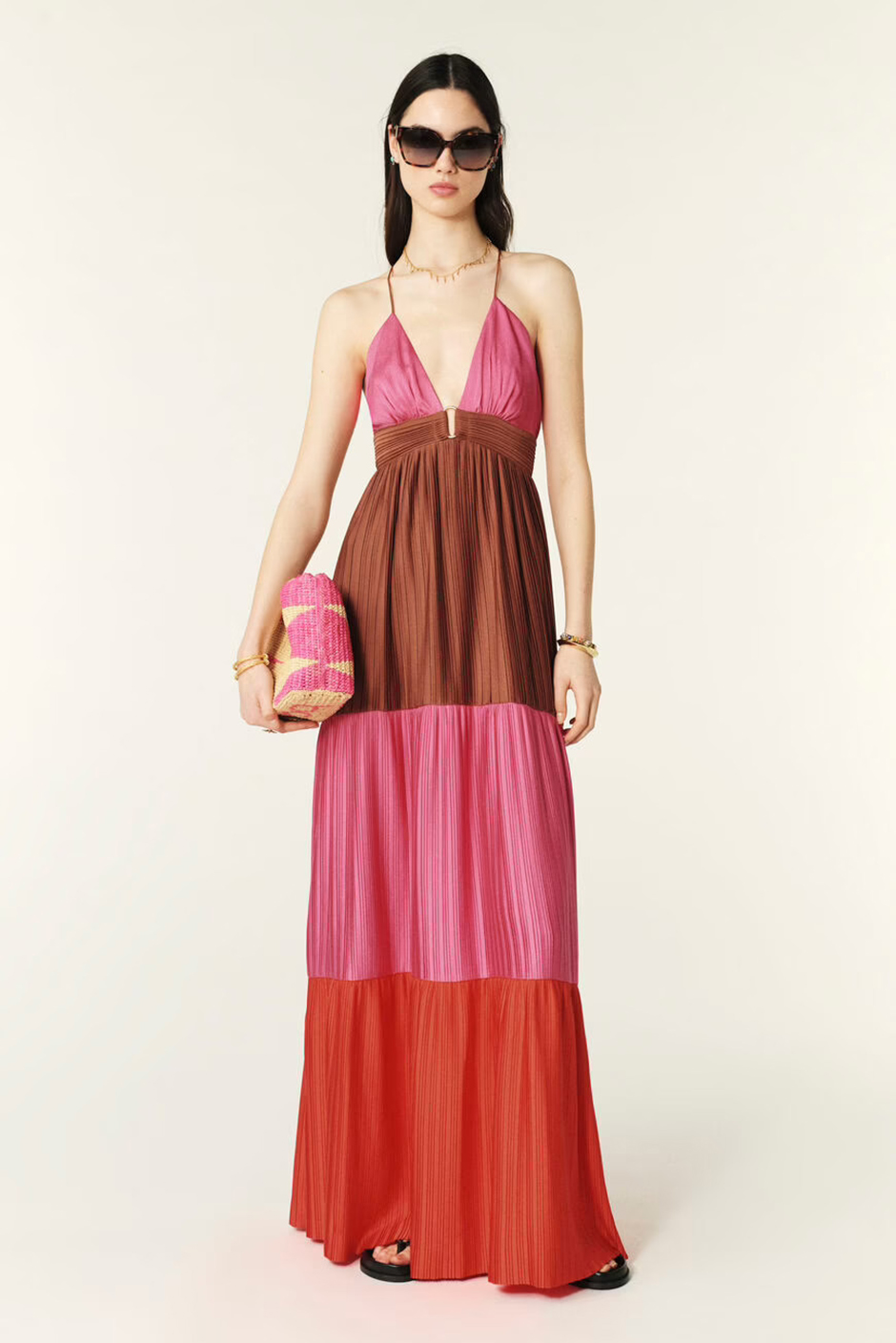 Maxi dress with plunge neckline and open back in brown, pink and red for summer wedding guest dress idea
