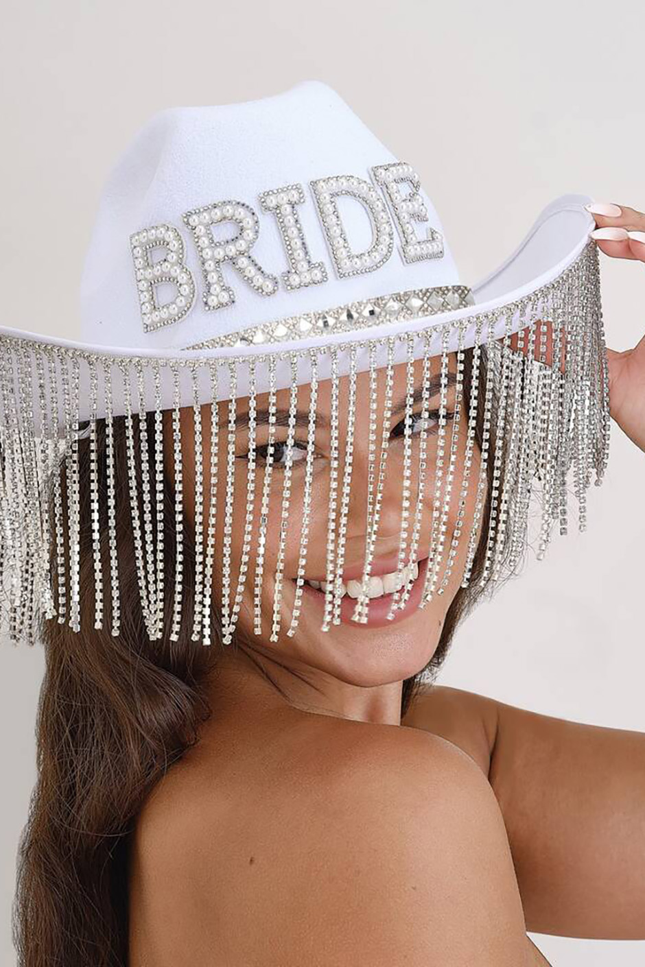 White cowboy hat with silver embellished bride and fringe for 