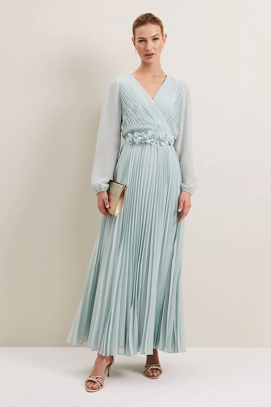 Spring bridesmaid dress from Phase Eight - pale blue pleated maxi dress with sheer sleeves and floral applique belt