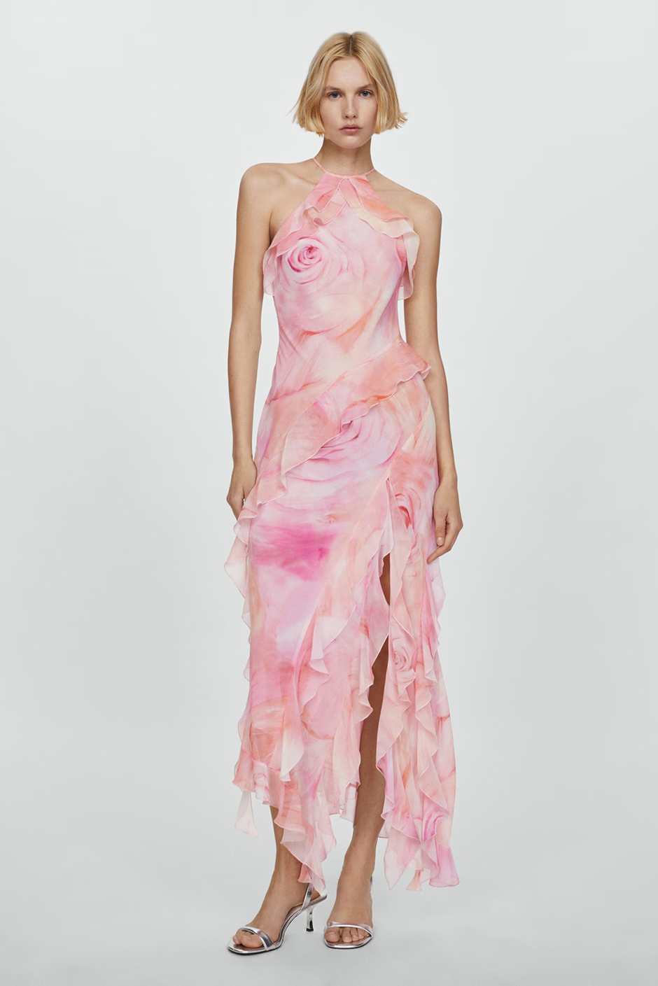 Pink wedding guest dress from Mango with floral design and ruffles