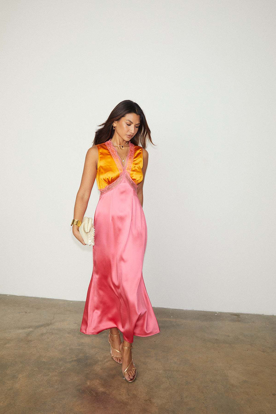 Pink and orange satin midi dress with lace detail from Never Fully Dressed for summer wedding guest dress idea