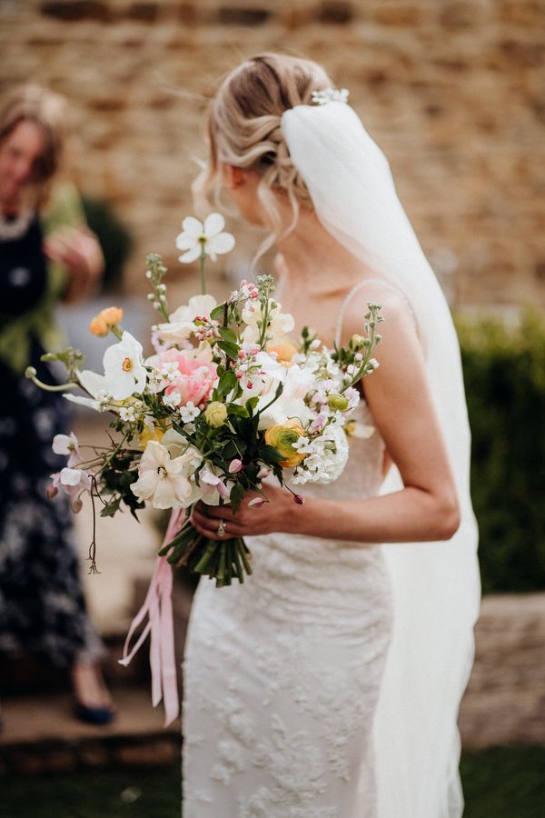 Spring bridal bouquet all dressed up with somewhere to go - photography by Nat and Lizzy weddings 