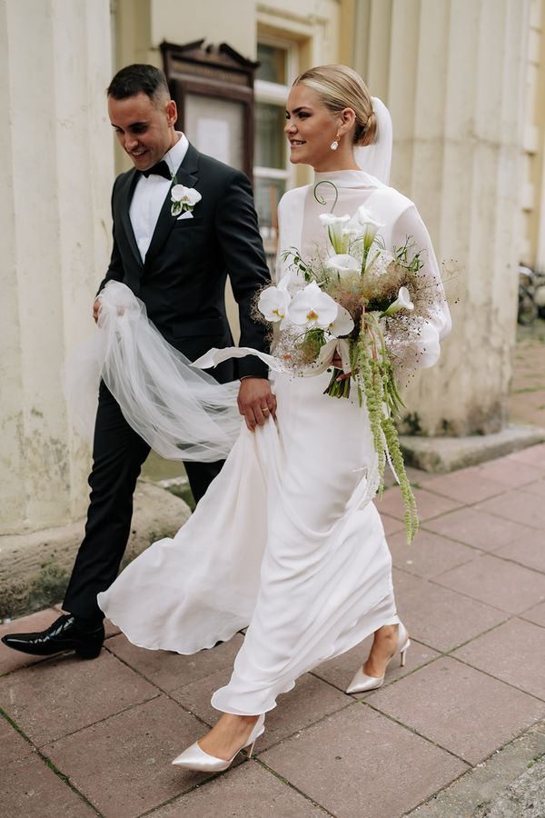 Jess & Alex - Modern Brighton Wedding - Photos: @lucydracottphoto Dress - Under dress @michaellosordo over dress @bibiluxestudio alterations by @the_bridal_atelier_brighton Veil - @laceandfavour Suit - @boss Shoes - @dune_london Jewellery - @monicavinader Cake - @hollyanncakedesign Flowers - @magicflowersandgifts Venue - @theseahorsebrighton Confetti - @proper.confetti Hair - @hair_by_zoe_brighton Video - @nmfilms__ Ribbons - @cfleursdesign