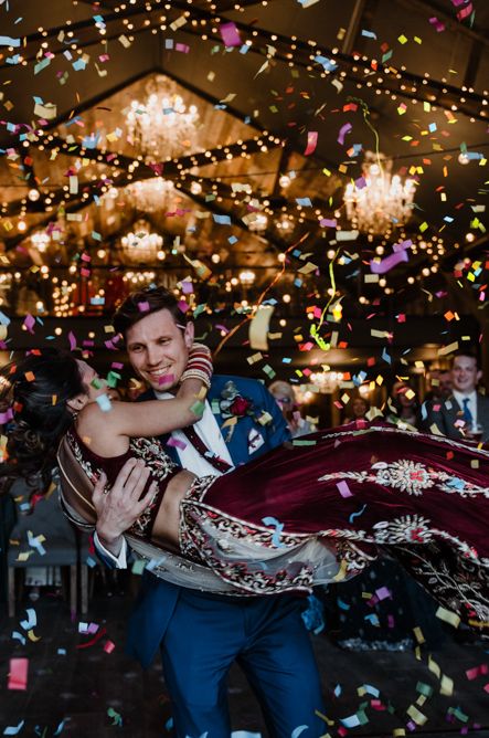 Anglo Indian Fusion Wedding for 200 guests at Wharfedale Grange, Yorkshire. Bride wears a traditional Lengha. Photography by Kazooieloki.