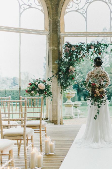 Blush & Burgundy Floral Fairytale Wedding at Grittleton House Planned & Styled by Jennifer Louise Weddings with Floral Arch. Katherine Yiannaki Photography