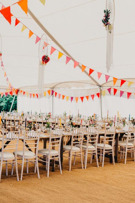 Colourful Bunting Wedding Decor for a Festival Themed Marquee Wedding with Fox Wedding Gown by Rue de Seine, shot by Peppermint Love Photography