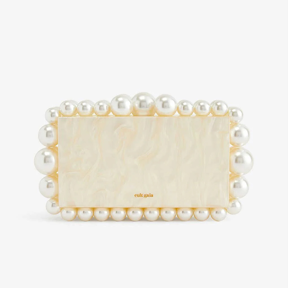 Acrylic bridal clutch with faux-pearls in ivory from Cult Gaia / Selfridges 