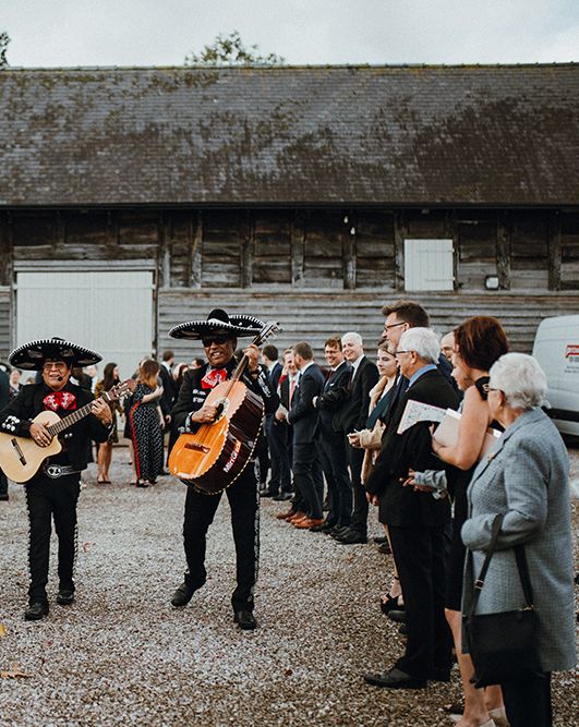 Mariachi Band and Persian Rug Aisle for Autumn Wedding | Needle &amp; Thread Astral Dress | Pimhill Barn | Waitrose Naked Wedding Cake | Leah Lombardi Weddings