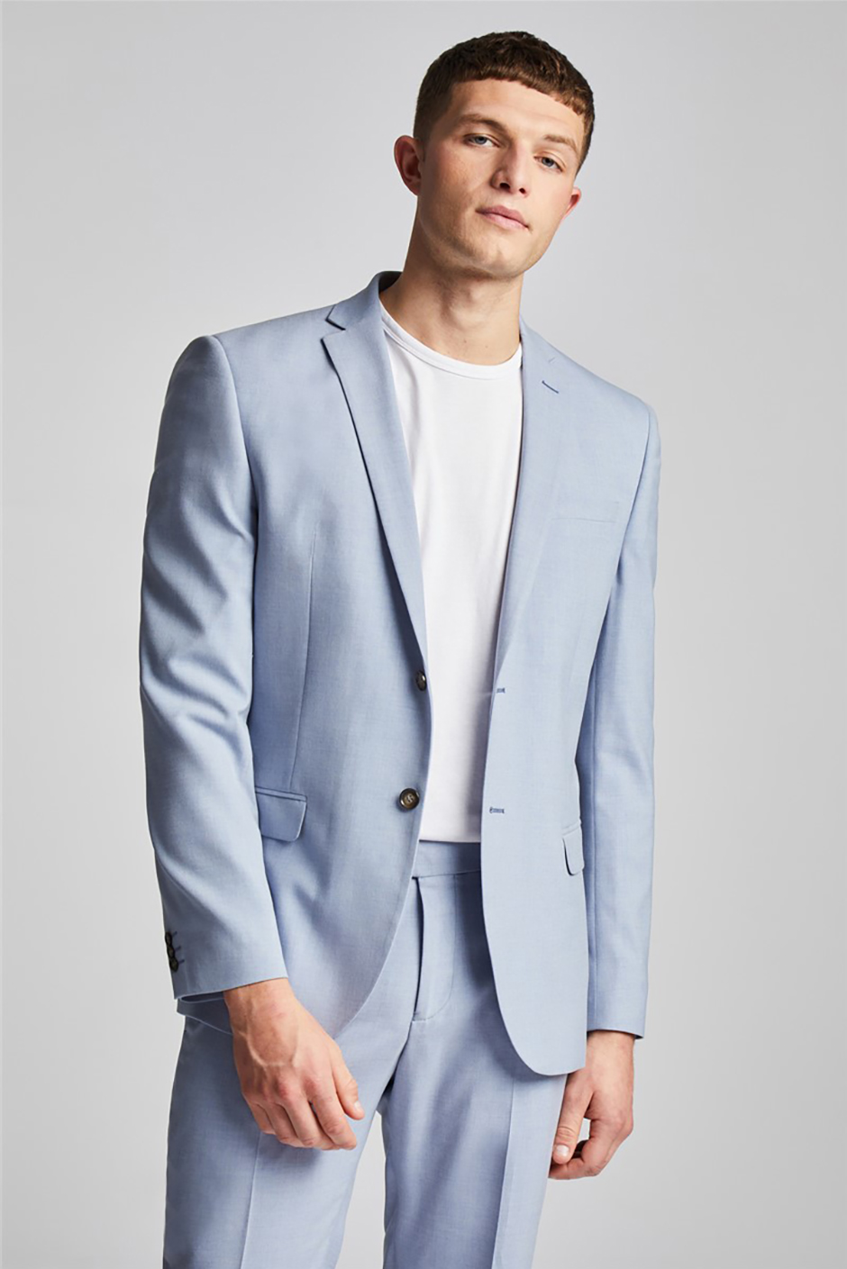 Pale cloud blue groomsmen suit for summer weddings from Suit Direct