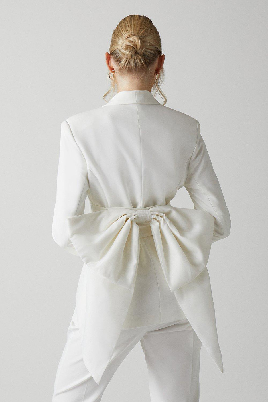 White bridal blazer with statement bow belt from Coast
