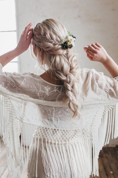 wildflower hair company free spirited bride with boho braid hairstyle with plaits and acessory with wildflowers herbs and blackberries