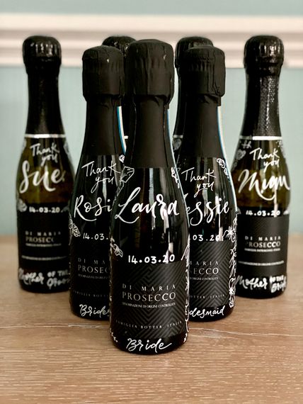 mint lettering miniature prosecco bottles for a special bridal team