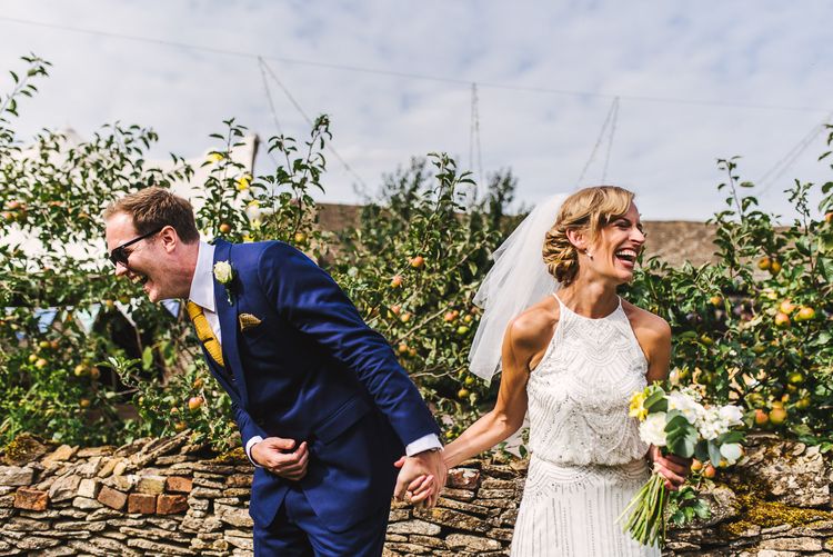kevin fern photography laughing bride and groom in tetbury 2