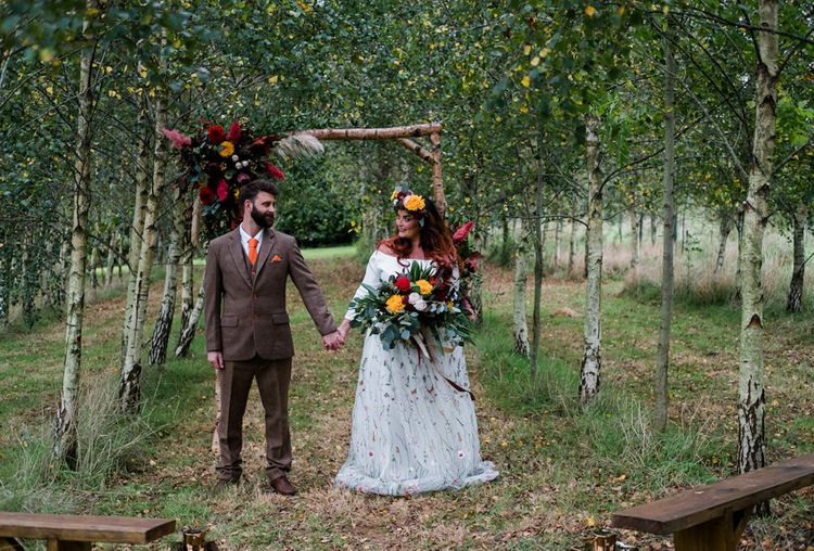 Devon woodland wedding venue couple holding hands
