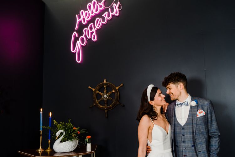 Hello gorgeous neon sign for Blue and red wedding bouquet for colourful wedding theme