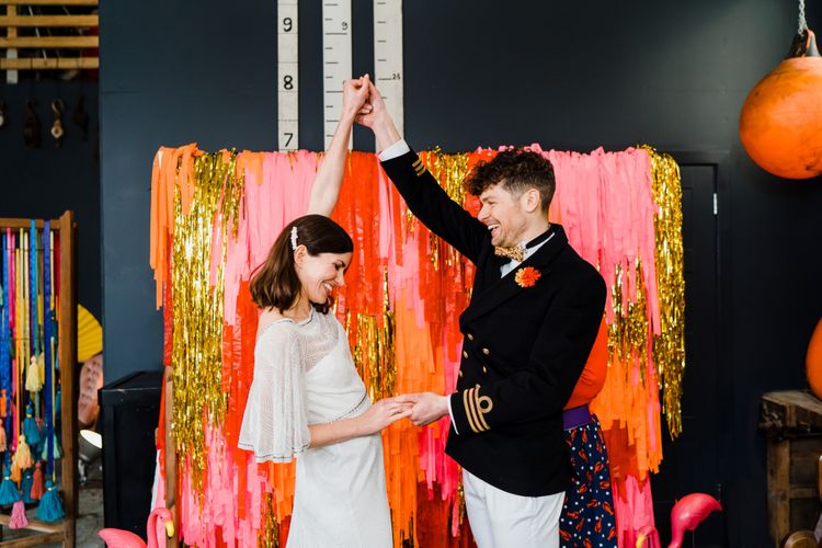 Wedding ceremony with glitter curtain altar