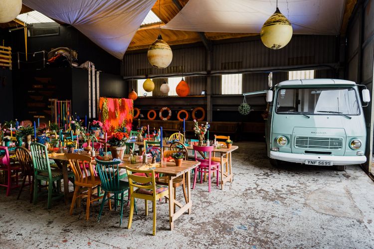 Industrial boat shed reception with colourful wedding theme