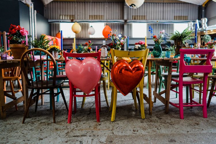 Heart chair back decor for colourful wedding theme