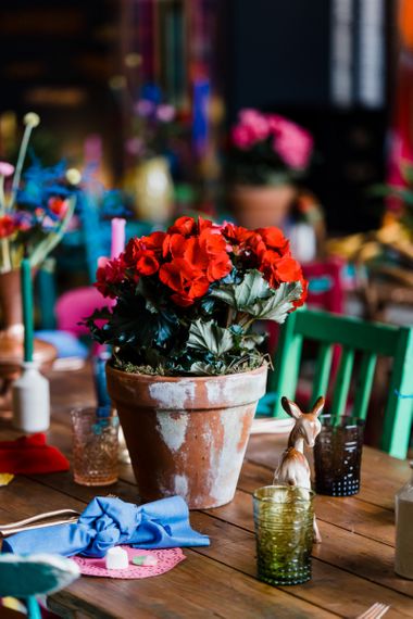 Red plant pot flower centrepiece