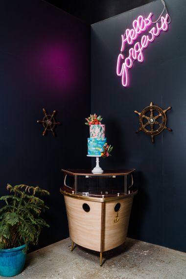 Colourful wedding cake on boat bar