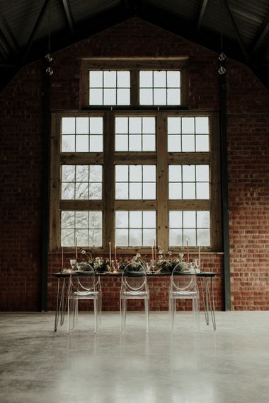 Elegant tablescape at The Giraffe Shed with Ghost chairs and bridal crop top