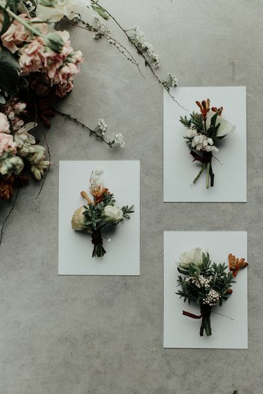 Delicate buttonhole wedding flowers