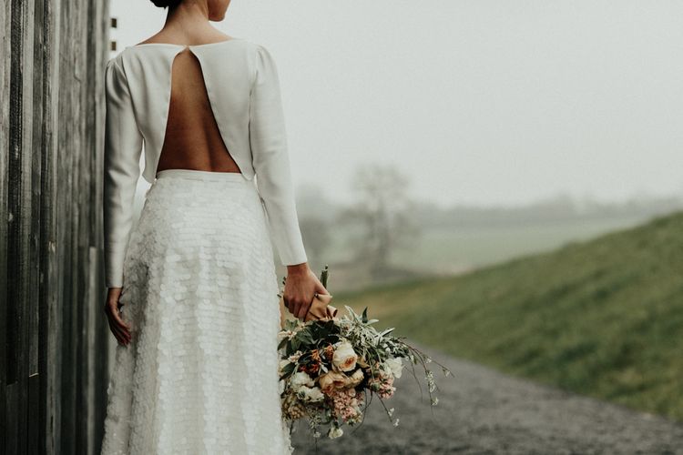 Bridal crop top with open back teamed with a sequin skirt