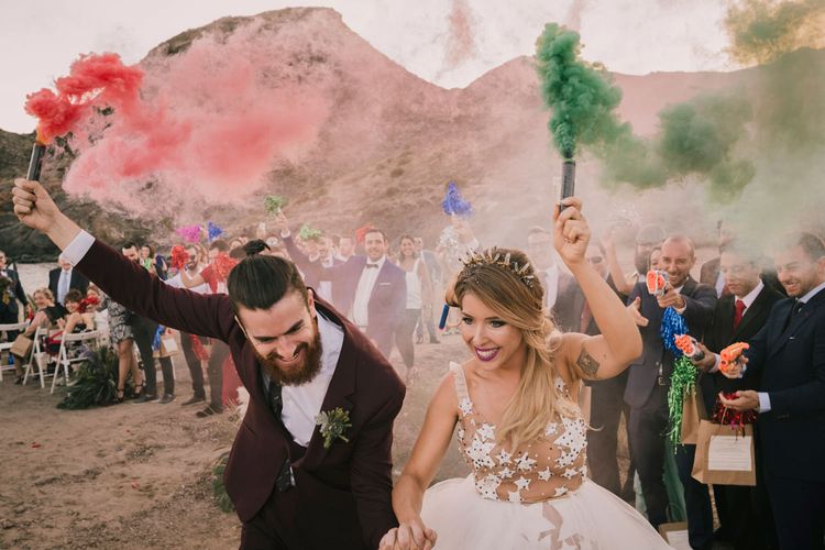 Spanish Beach wedding with smoke bombs