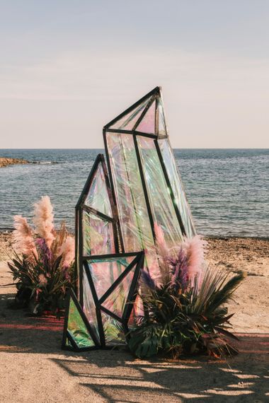 Iridescent geode structures at Spanish Beachj wedding
