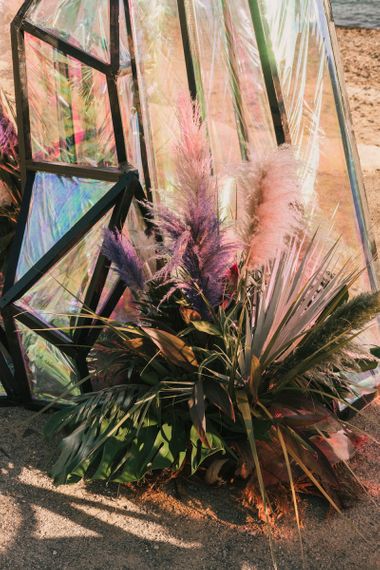 Iridescent geode structures at Spanish Beachj wedding