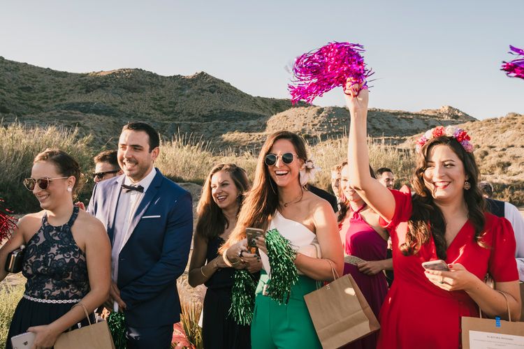 Guests at a Spanish beach wedding