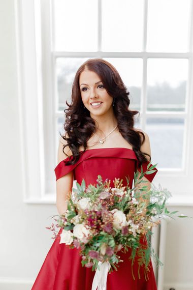Beautiful Bride in Bespoke Red Wedding Dress from Agape Bridal Boutique | Red New Years Eve Winter Wedding at Iscoyd Park, Shropshire | White Stag Wedding Photography | Lovetwofilm
